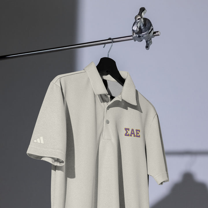 SAE Letters Space Dyed Polo by Adidas